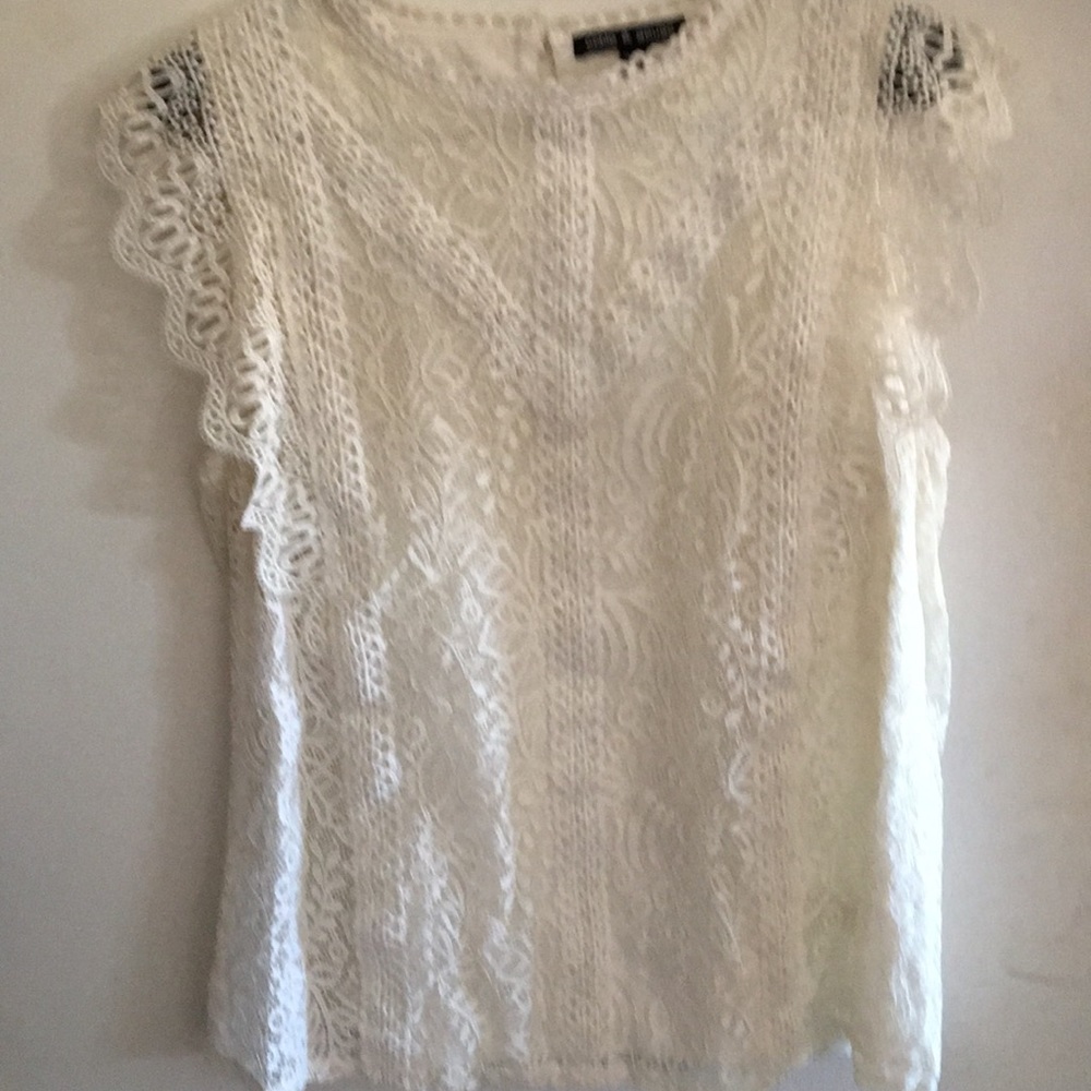 White lacy sleeveless blouse